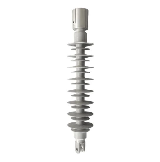 Composite polymeric post insulator for railway lines with silicone rubber sheds and metal end fittings